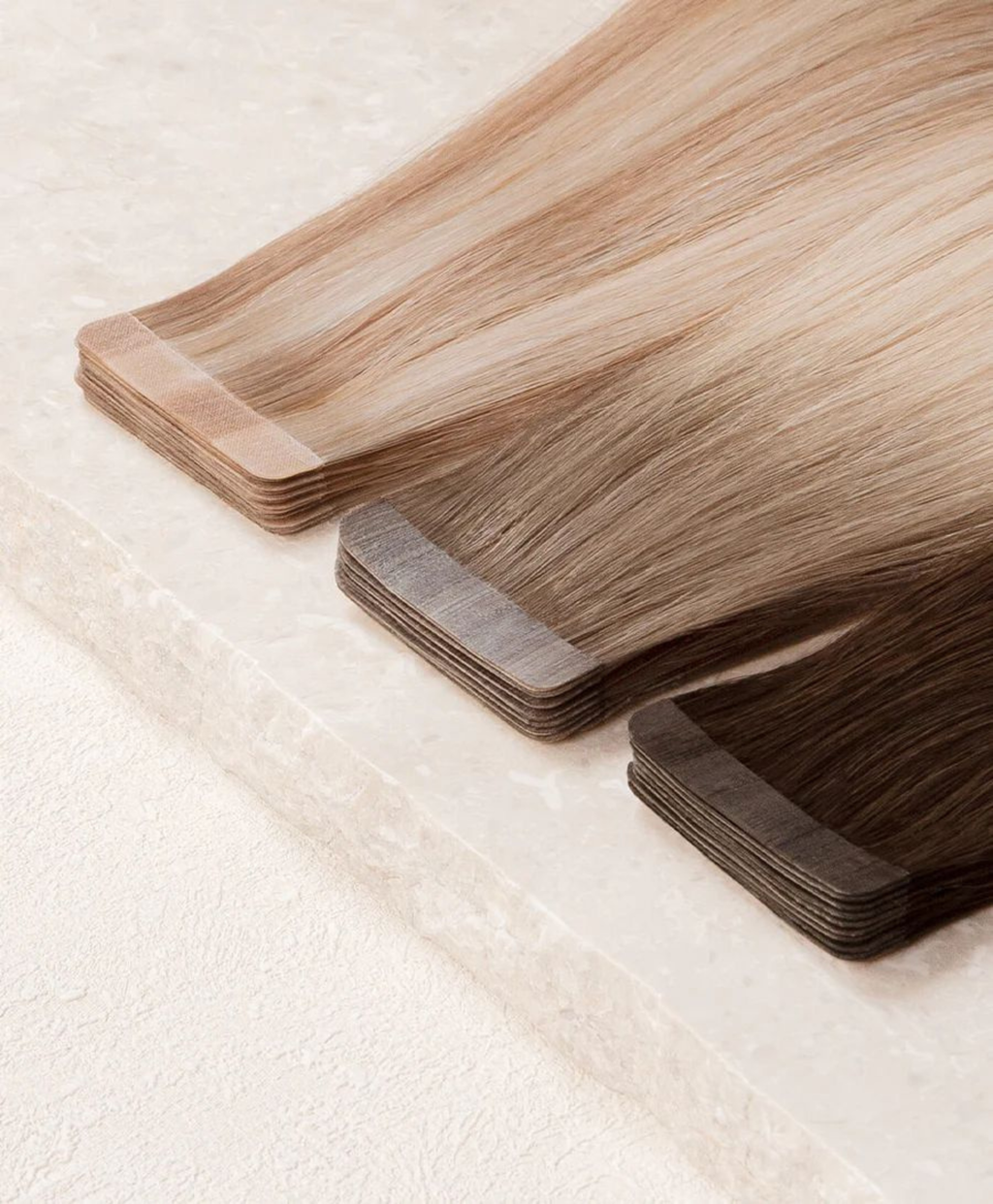 TAPE IN HAIR EXTENSIONS