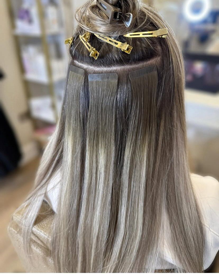 INJECTED TAPE IN HAIR EXTENSIONS